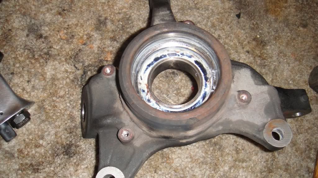 NEED REAL TIME HELP.....Outer bearing race stuck in knuckle housing